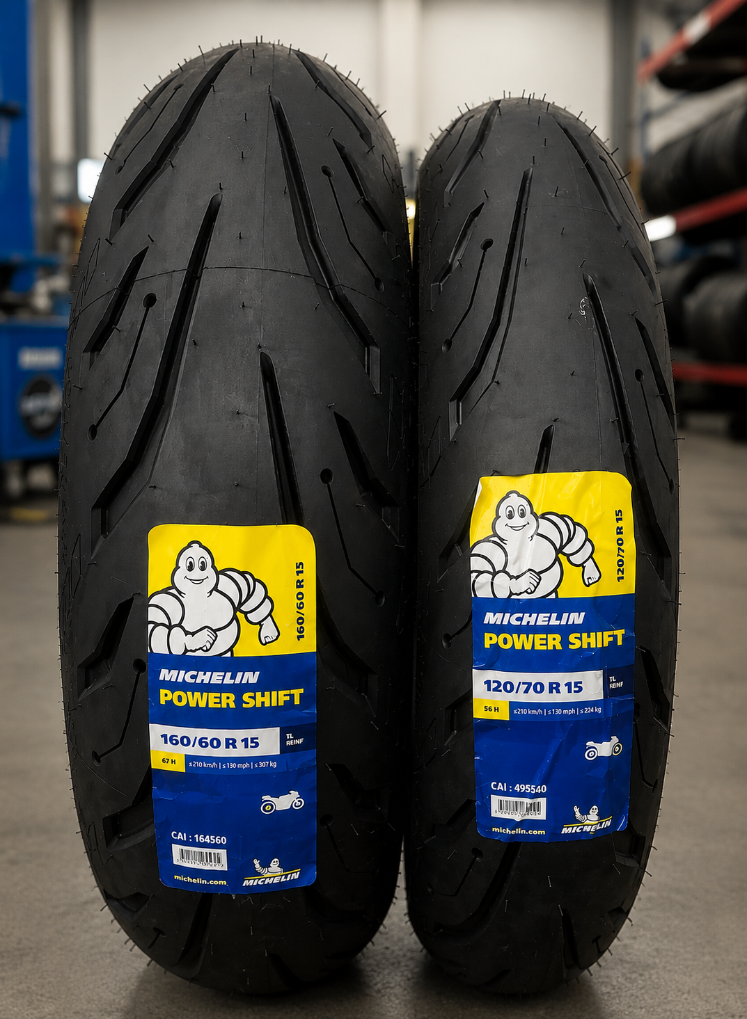 Michelin motorcycle tires, 120/70 R15 and 160/60 R15, with power shift design, featuring tread patterns and sidewall details.